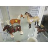 BESWICK FIGURE OF A HIGHLAND PONY, BESWICK FOAL A/F, A MELBAWARE SHIRE HORSE, AND ONE OTHER FOAL