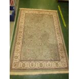 PALE GREEN GROUND PATTERNED RECTANGULAR FLOOR RUG WITH TASSELLED ENDS (135 X 190 CM)