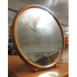 CIRCULAR TABLE MIRROR WITH A LIGHT WOOD FRAME