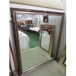 LARGE RECTANGULAR WALL MIRROR IN BURNISHED EFFECT FRAME.