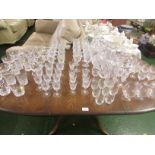 LARGE SELECTION OF GLASS DRINKING VESSELS INCLUDING WINE GLASSES, SUNDAE DISHES, TUMBLERS WITH