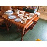 OAK VENEERED EXTENDING DINING TABLE TOGETHER WITH SIX LADDER BACK CHAIRS INCLUDING TWO CARVERS (