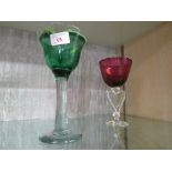 SIGNED GEORGE ELLIOTT STUDIO GLASS GOBLET, AND A CRANBERRY GLASS GOBLET WITH HEART SHAPED STEM