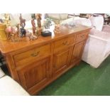 WILLIS & GAMBIER STAINED OAK SIDEBOARD WITH THREE DRAWERS OVER THREE CUPBOARD DOORS