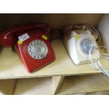 REPRODUCTION RED DIALLER TELEPHONE AND A CREAM DIALLER TELEPHONE