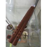 FAR EASTERN STYLE CARVED WOODEN FLUTE.