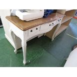 WHITE PAINTED THREE DRAWER HALL TABLE WITH SERPENTINE FRONT