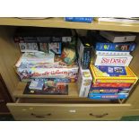 ONE SHELF OF BOARD GAMES, JIGSAW PUZZLES ETC