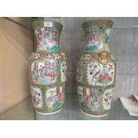PAIR OF LARGE CHINESE PORCELAIN FAMILLE ROSE VASES PAINTED WITH INTERIOR AND GARDEN SCENES AND