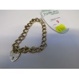 9 CARAT GOLD BRACELET WITH 9 CARAT GOLD HEART SHAPED PADLOCK CLASP.