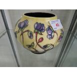 A MOORCROFT POTTERY OVOID VASE, PALE YELLOW GROUND DECORATED WITH PURPLE FLOWERS, SIGNED EMMA