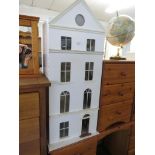 WHITE PAINTED FOUR STOREY DOLLS HOUSE