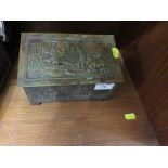 VINTAGE JACOB AND CO BISCUIT TIN IN FORM OF A COFFER WITH EMBOSSED BRASS LID DEPICTING FARMING