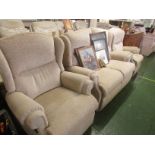 BEIGE UPHOLSTERED WINGBACK TWO SEATER SOFA TOGETHER WITH TWO MATCHING MANUALLY RECLINING ARMCHAIRS