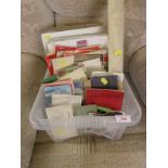 A box of assorted photographs, magazines, car brochures and scrap books.