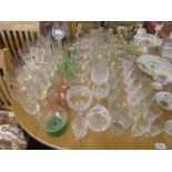 Selection of cut glass drinking vessels and sundae dishes.