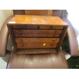 Oak engineers tool chest with six drawers including contents.