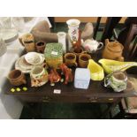 Selection of decorative china and pottery including teapots, mugs, figurines, cups etc