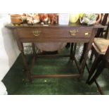 Nineteenth Century oak single drawer side table, brass handles, stretchered legs. As found.