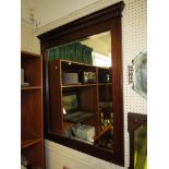 LARGE BEVEL EDGED WALL MIRROR IN A CORNICED MAHOGANY FRAME