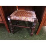 Wooden strung top footstool. As found