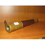 BRASS AND LEATHER CLAD THREE-DRAW TELESCOPE SIGNED 'M.MOSES SWANSEN, DAY OR NIGHT'