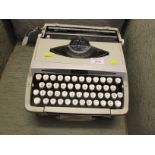 Smith Corona Zephyr manual typewriter with plastic case
