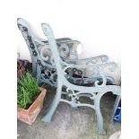 TWO PAIRS OF PALE GREEN PAINTED CAST METAL CHAIR ENDS (SEE ALSO LOTS 183 & 186)