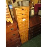 Two composite pine six drawer sets of storage drawers