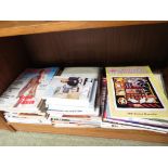 SHELF OF DRESS PATTERN MAGAZINES, CRAFT BOOKS AND DVDS