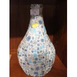 GLASS VASE CLAD IN POTTERY MOSAIC