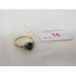 SAPPHIRE RING WITH SHANK STAMPED 750 A1711, SET WITH AN OVAL SAPPHIRE (7.5MM X 5.5MM) AND SIX VERY