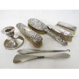 THREE SILVER CLAD CLOTHES BRUSHES, DRESSING TABLE BOX WITH SILVER LID, SILVER CLAD CANDLE STICK