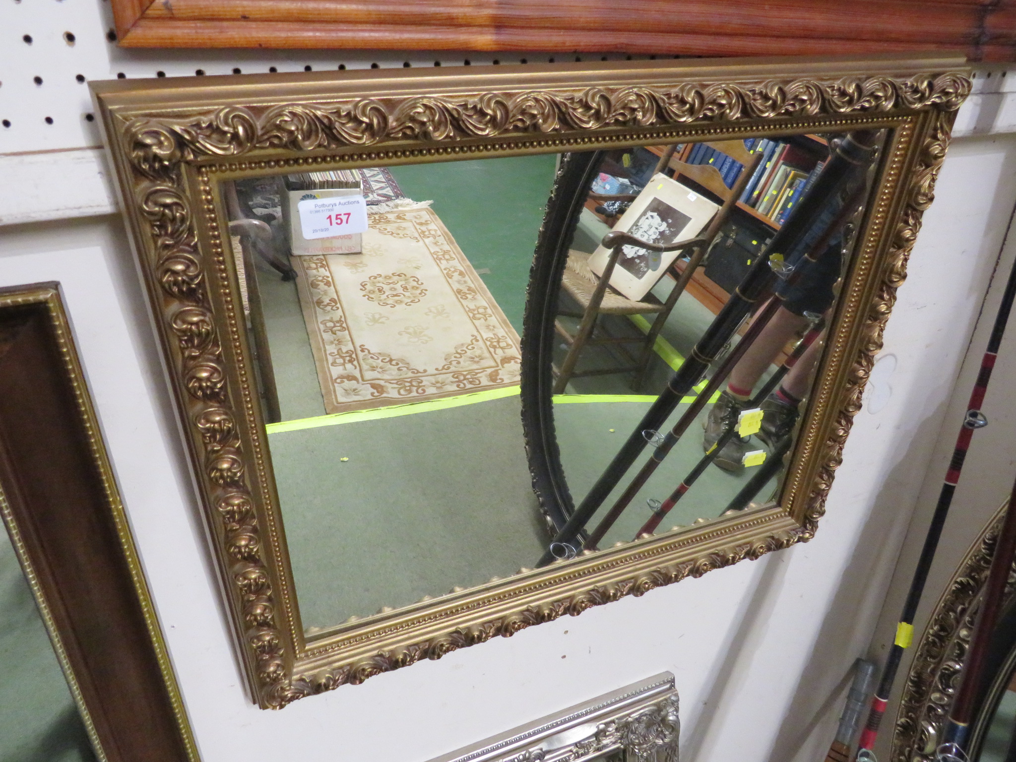 RECTANGULAR WALL MIRROR IN A MOULDED GILT EFFECT FRAME