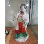 PORCELAIN FIGURE OF MAN IN TRADITIONAL DRESS, MARKED MADE IN USSR