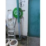 METAL BIRD FEEDER POLE WITH VARIOUS FEEDERS AND A SCROLLED WROUGHT METAL ITEM