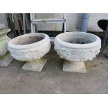 PAIR OF COMPOSITE STONE GARDEN POTS