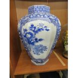 LARGE OCTAGONAL CHINESE PORCELAIN BALUSTER VASE DECORATED IN BLUE AND WHITE WITH FOLIAGE AND TWO