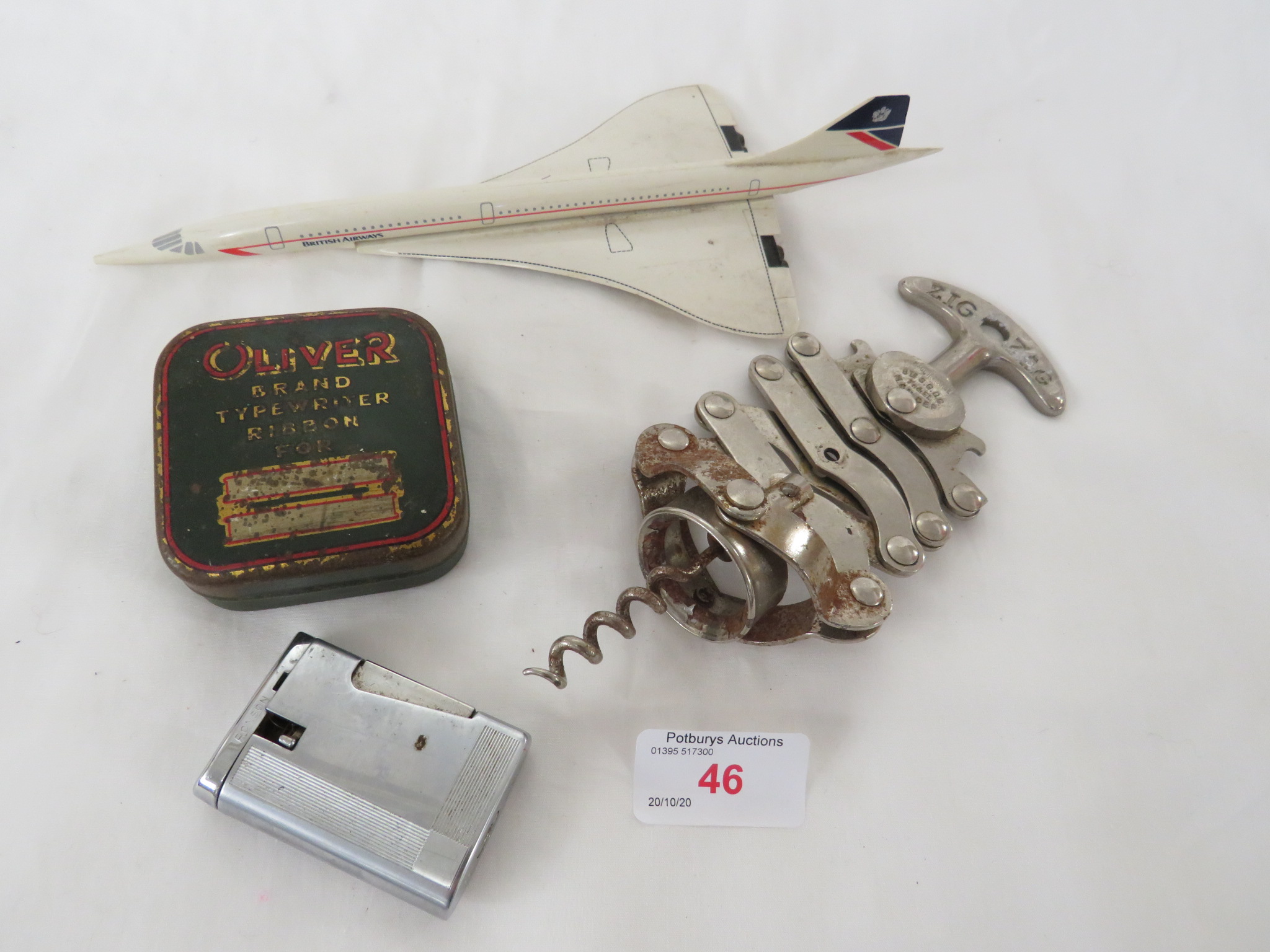 SMALL PLASTIC MODEL OF CONCORDE, ZIG-ZAG CORKSCREW, VINTAGE TIN AND A RONSON LIGHTER