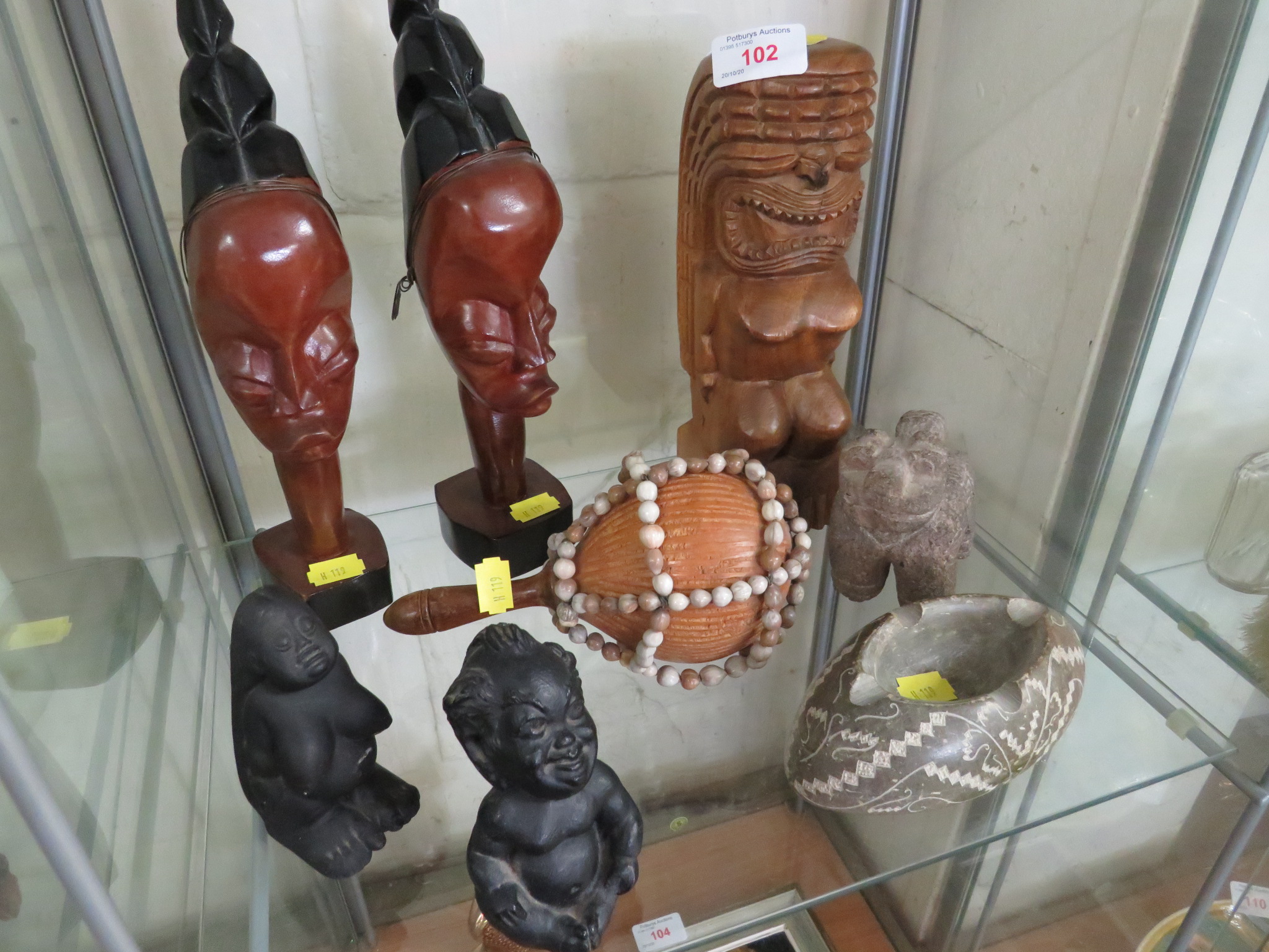 CARVED WOODEN TRIBAL STYLE FIGURES, HAWAIIAN LAVA FERTILITY FIGURE, CARVED STONE DOG, ASH TRAY AND