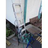 TWO TREAD STEPS, SMALL ALUMINIUM EXTENDING LADDER, SHEARS AND HOSE ON REEL