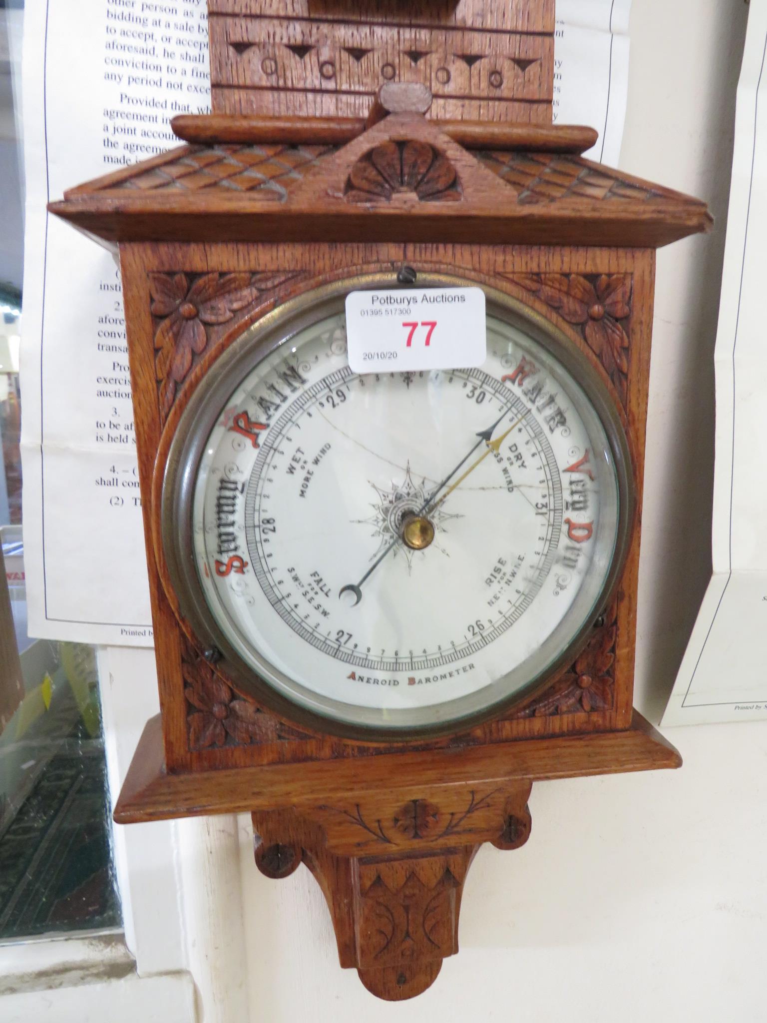ANEROID BAROMETER AND THERMOMETER ON A CARVED OAK MOUNT - Image 2 of 2