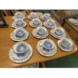 ROYAL PORCELAIN TETTAU TEA SERVICE IN WHITE BLUE AND GILT, WITH TWELVE TEA CUPS AND SAUCERS AND