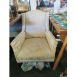 EDWARDIAN LOW BEDROOM ARMCHAIR WITH SATIN UPHOLSTERY AND LATER FITTED STRETCH COVER