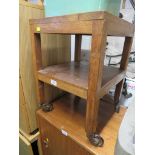 OAK TWO TIER TABLE WITH CASTORS