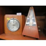 OAK CASED ANEROID BAROMETER AND A METRONOME