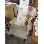 FIRESIDE WINGBACK ARMCHAIR IN BEIGE PATTERNED UPHOLSTERY