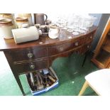 REPRODUCTION MAHOGANY VENEERED BOW FRONTED SIDE TABLE WITH FIVE DRAWERS AND BRASS LOOP HANDLES