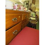 STAINED WOOD SIDEBOARD WITH SEVEN DRAWER AND CENTRAL CUPBOARD AND BACK RAIL