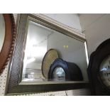 RECTANGULAR BEVELLED WALL MIRROR IN A SILVER COLOURED FRAME